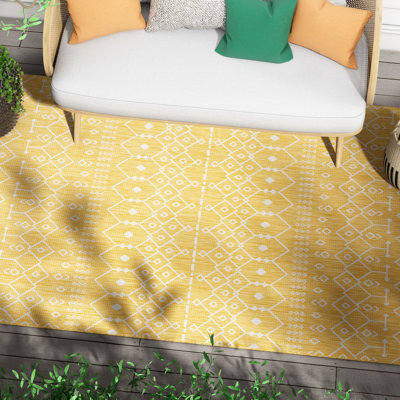 Tapis intérieur / extérieur jaune Marshanna