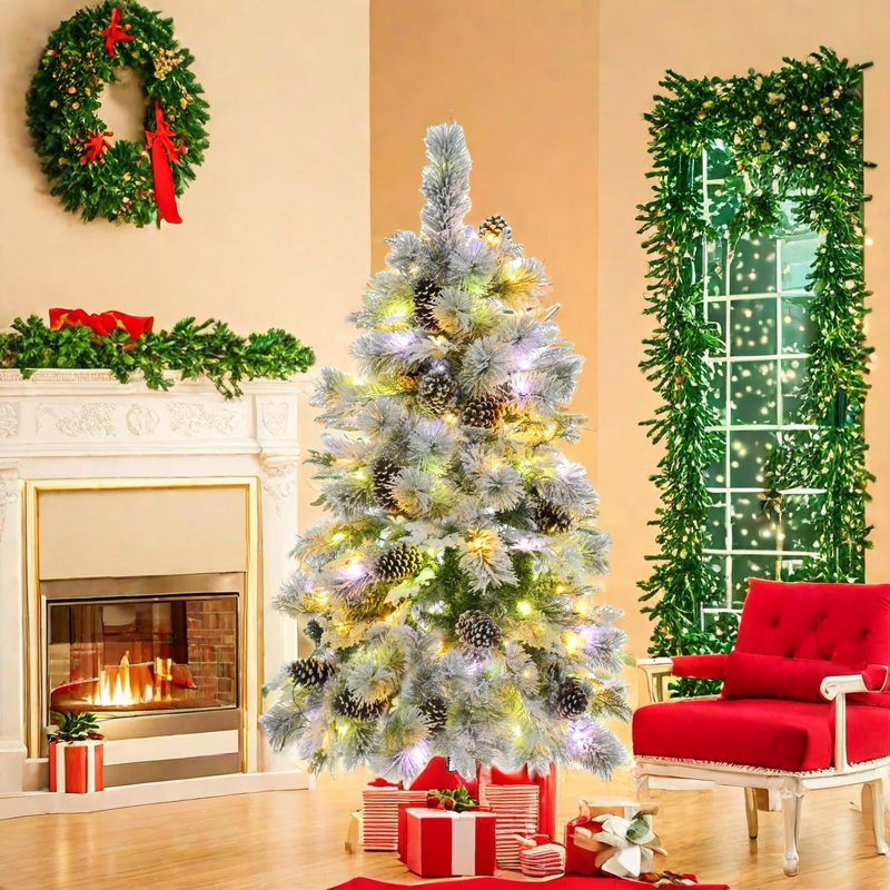 Artificial Snow Flocked Christmas Tree With Colour Lights