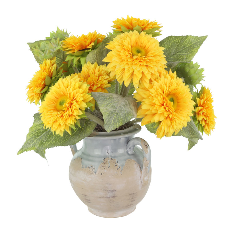 Tournesols disposés dans un vase en pierre