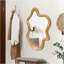 Miroir mural 33,46 "x 22,24" de forme irrégulière avec cadre en bois naturel