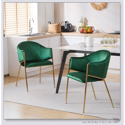 Chaise de salle à manger rembourrée en velours moderne avec structure dorée, alliant élégance, confort et durabilité pour toute salle à manger.