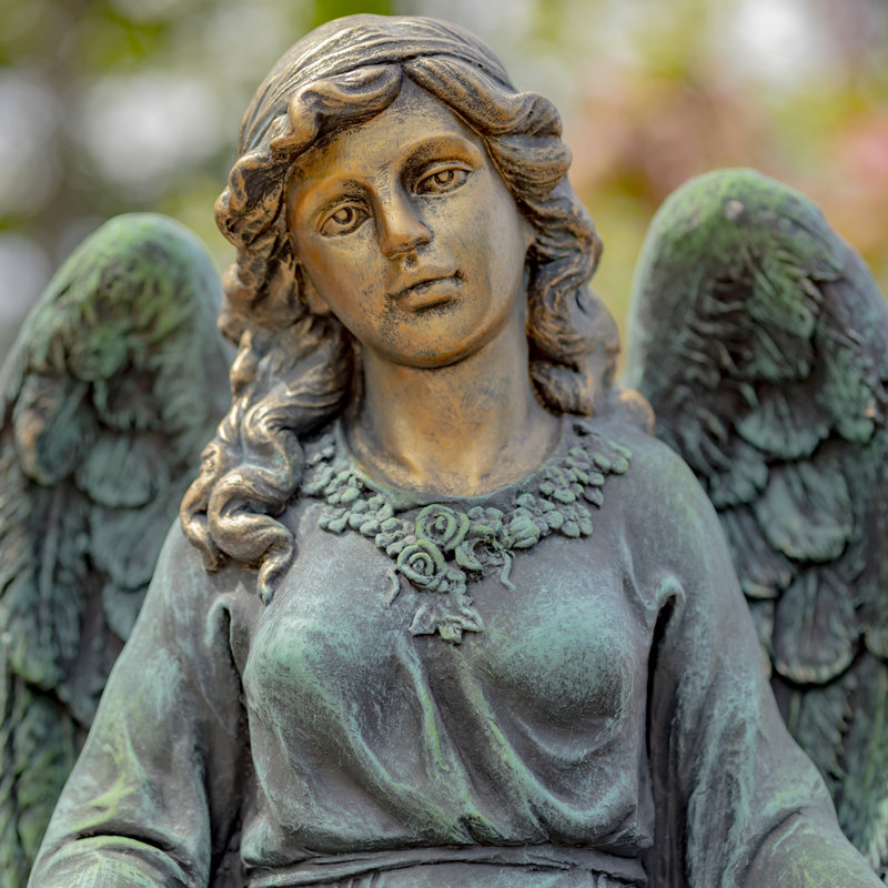 Ange tenant une statue de jardin en magnésium, Bronze antique