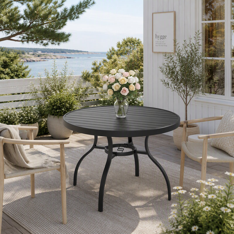 Table de salle à manger ronde noire de 104 cm (41 pouces), monobloc, moderne et polyvalente, idéale pour l'intérieur et l'extérieur, sur une terrasse ou un balcon d'appartement.