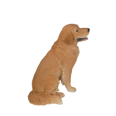 Statue golden retriever assis