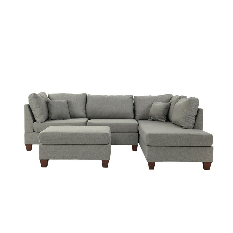 Canapé modulaire réversible en polyfibre avec repose-pieds, gris, parfait pour des sièges polyvalents et confortables dans n'importe quel salon.