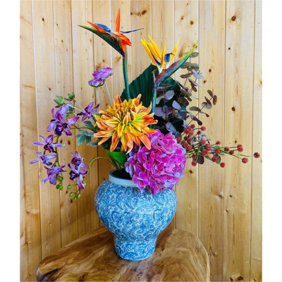 Artificial Flowers Arrangement in a Large Ceramic Vase