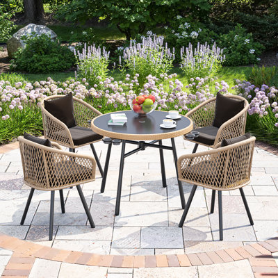Lavette 4 - Person Patio Dining Set Round Table with Cushions Included
