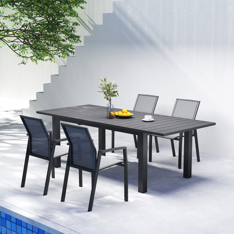 Calliana Patio Dining Set with Extendable Dining Table and Fully Assembled Stackable Chairs