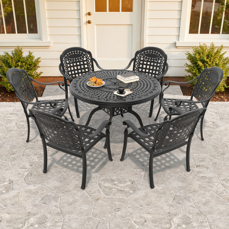 Shanese 7-Piece 47.24 -inch Round Table Cast Aluminum Outdoor Dining Set with Umbrella Hole and Blue Cushions