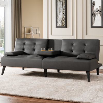Killen Full 64" Wide Faux Leather Loose Back Convertible Sofa with Storage