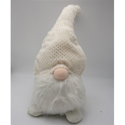 Gnome en tissu crème blanc flou