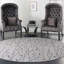 Tapis gris à motif floral Aratrika-133573510