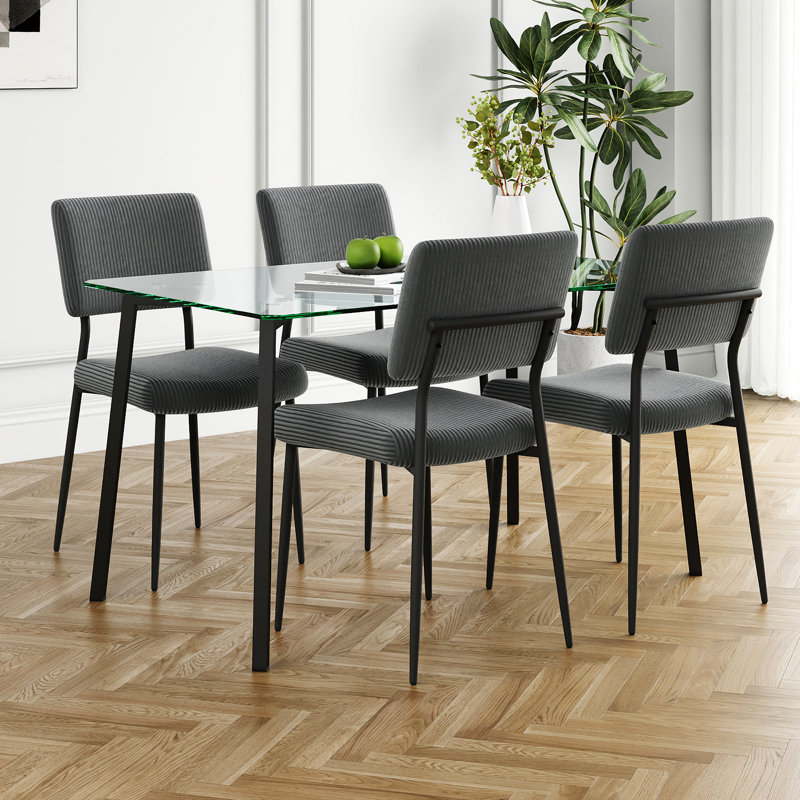 This Five-piece Set Includes A Modern Tempered Glass Table And Four Chairs For A Four-person Square Glass Dining Room, As Well As A Tiny Kitchen Table And Chairs That Are Ideal For Small Rooms Or Apartments.