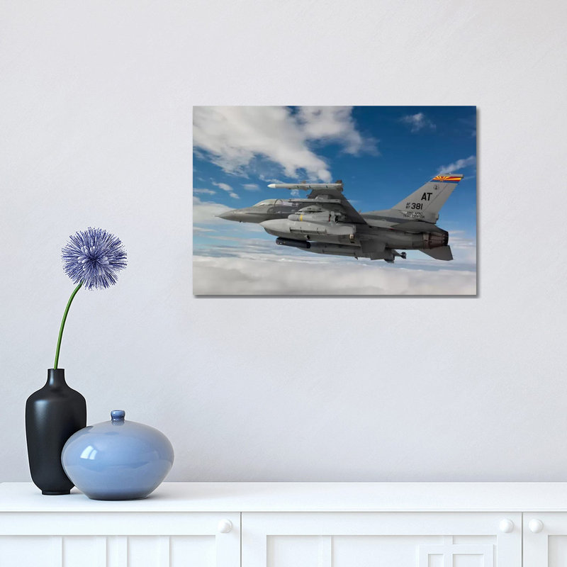 F-16 Fighting Falcon Flies With An AGM-65 Maverick Missile by HIGH-G Productions - Wrapped Canvas Print