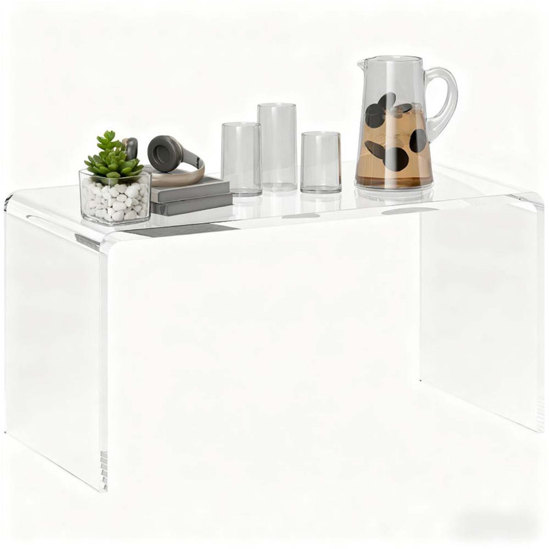 Table basse moderne en acrylique avec design transparent et fabrication robuste, pour rehausser l'espace et l'élégance de la pièce