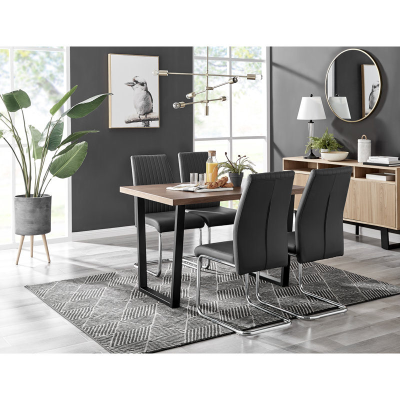 Edzard Industrial Style Wood Effect Dining Table Set with 4 Luxury Faux Leather Dining Chairs, Black/Silver
