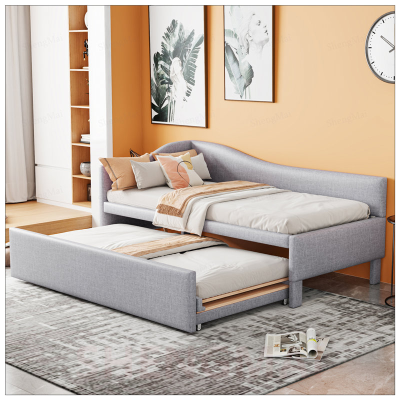 Lit de jour simple en L rembourré en forme de L avec lit gigogne escamotable, élégant et polyvalent pour tout décor