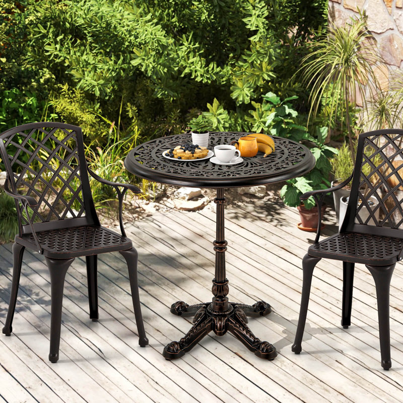 Table bistro ronde 27 po en aluminium coulé avec base en croix pour la cour