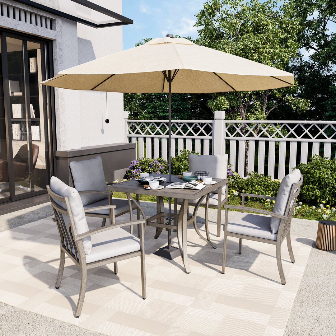 Freada 4 - Person Metal Patio Dining Set with Square Table , Cushions Included Red Barrel Studio®