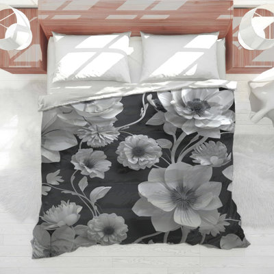 Édredon noir et blanc à motif floral