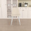 4 chaises de salle à manger modernes en lin beige, avec structure élégante et pieds en métal blanc, idéales pour votre intérieur.