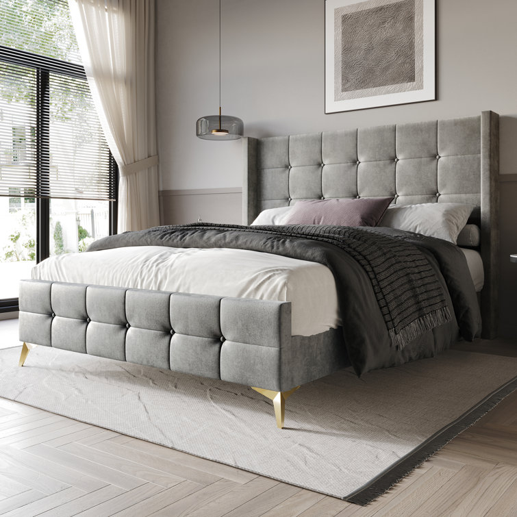 Karmane Upholstered Wingback Bed