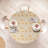 Winston Porter Floral Fitted Round Tablecloth 56"- 60" Diameter Pale Orange and White-2060311095