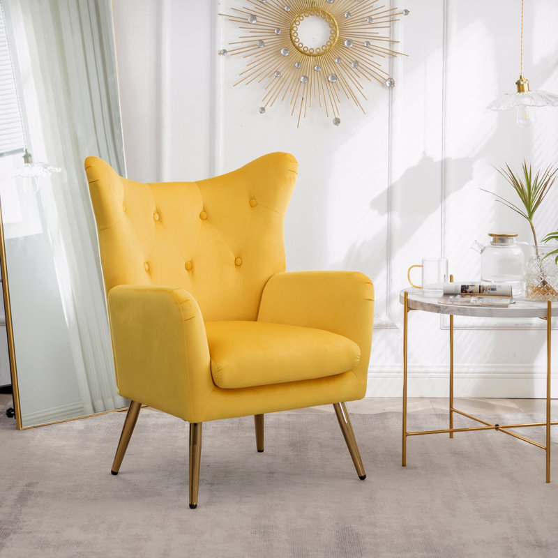 Fauteuil d'appoint en velours capitonné