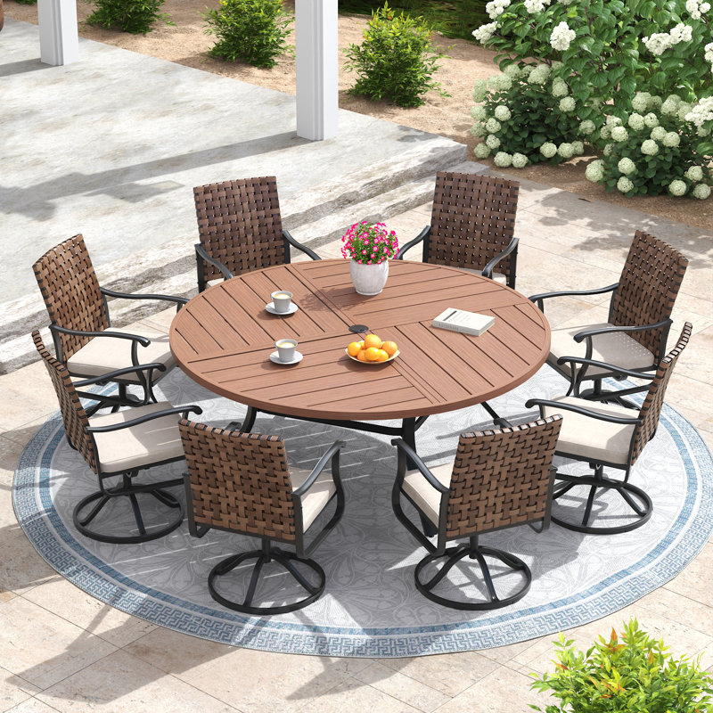 Ensemble repas pour 8 personnes avec table ronde de 60 po et 8 chaises et coussins pivotants en rotin de polyéthylène