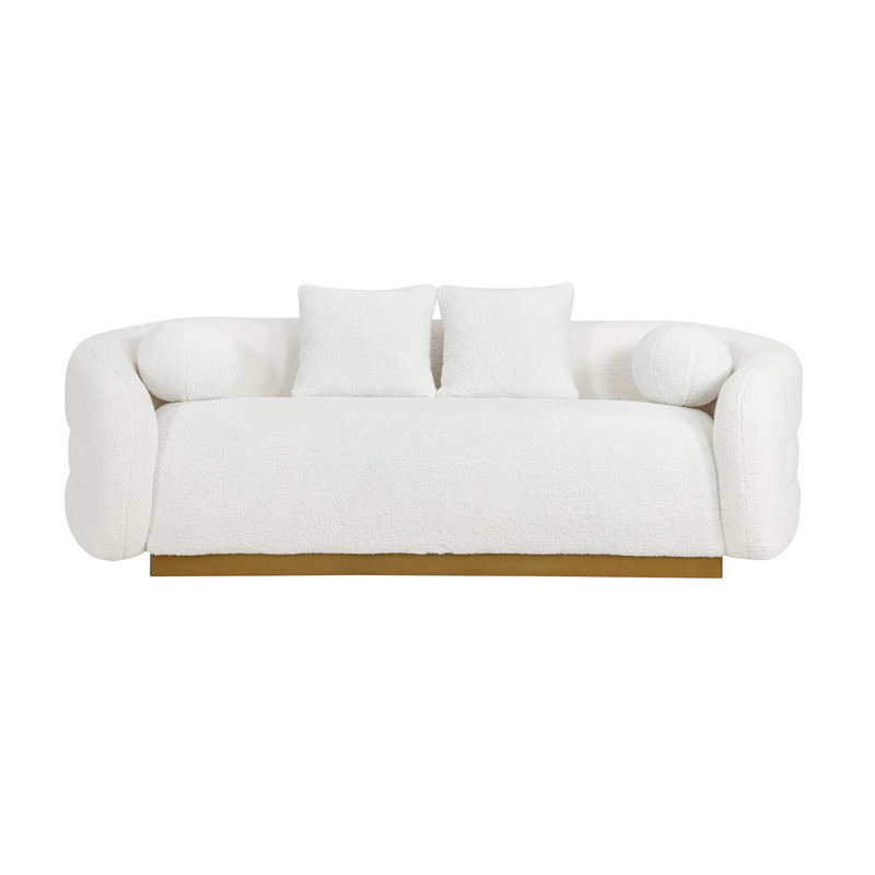 Luxueux canapé de salon avec coussins en tissu d'ameublement en tissu blanc doux doré