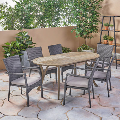 Eliger 6 - Person Acacia Wicker Patio Dining Set with Oval Table , Cushions Included