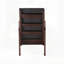Le fauteuil à bascule Raina
