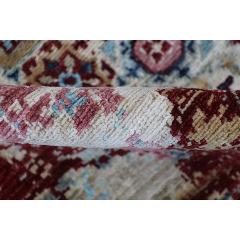 Tapis unique bleu clair / rouge / beige de 4 pi 11 po x 6 pi 11 po