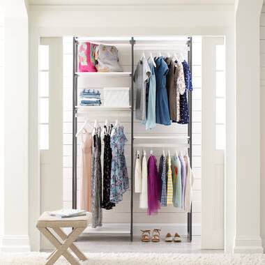 Spacious closet with built in shelves and two levels of hanging space by  Lawrence Homes, Inc, Photogra…