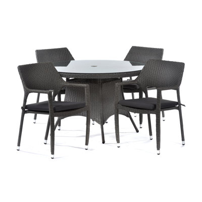 Olmeda 4 - Person Patio Dining Set with Round Table , Cushions Included