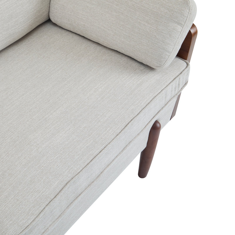 Canapé beige de style Mid-Century moderne avec coussins très moelleux et structure compacte pour une assise confortable