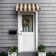 Awntech Charleston Acrylic Fabric Awning with Iron Scroll Arms