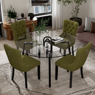 Ensemble de salle à manger rond avec chaises capitonnées