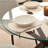 Kinnith 4 - Person Glass Top Pedestal Dining Set-94350942