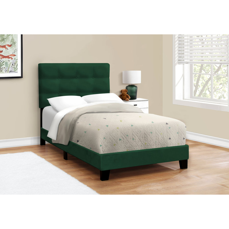 Lit simple tapissier en velours avec pieds stables