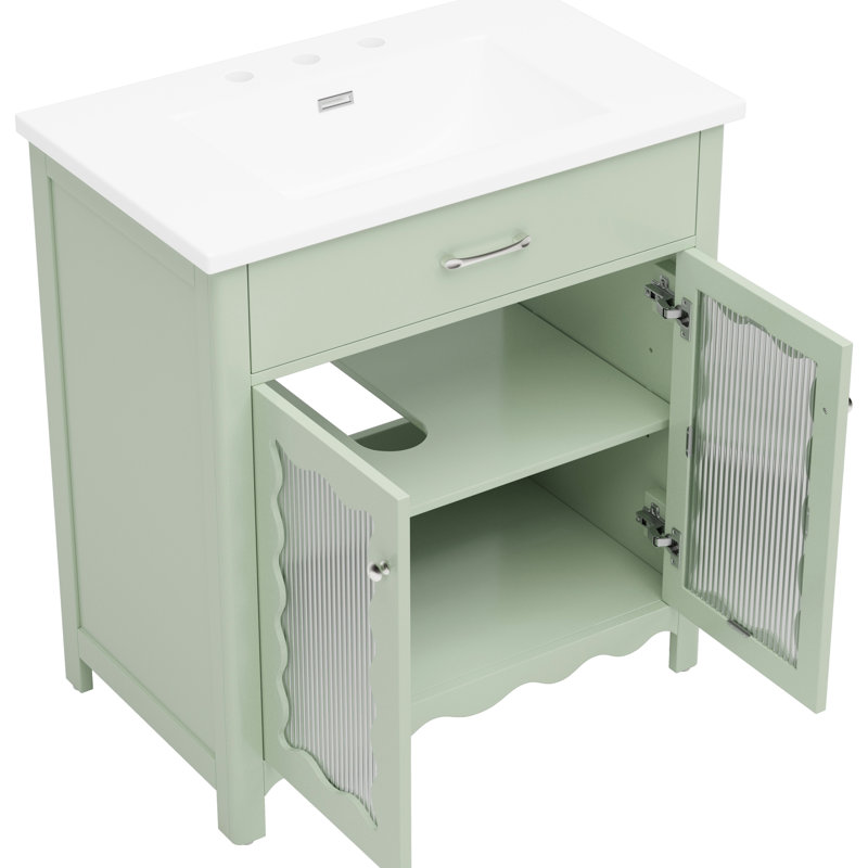 Meuble-lavabo de 79 cm avec lavabo rectangulaire en céramique, grand espace de rangement, rayures verticales et poignées argentées pour un design moderne et élégant. Profil incurvé, esthétique accueillante.