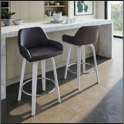 Tabouret de comptoir à hauteur fixe avec pivot en bois blanc et similicuir noir avec repose-pieds rond chromé - ensemble de 2