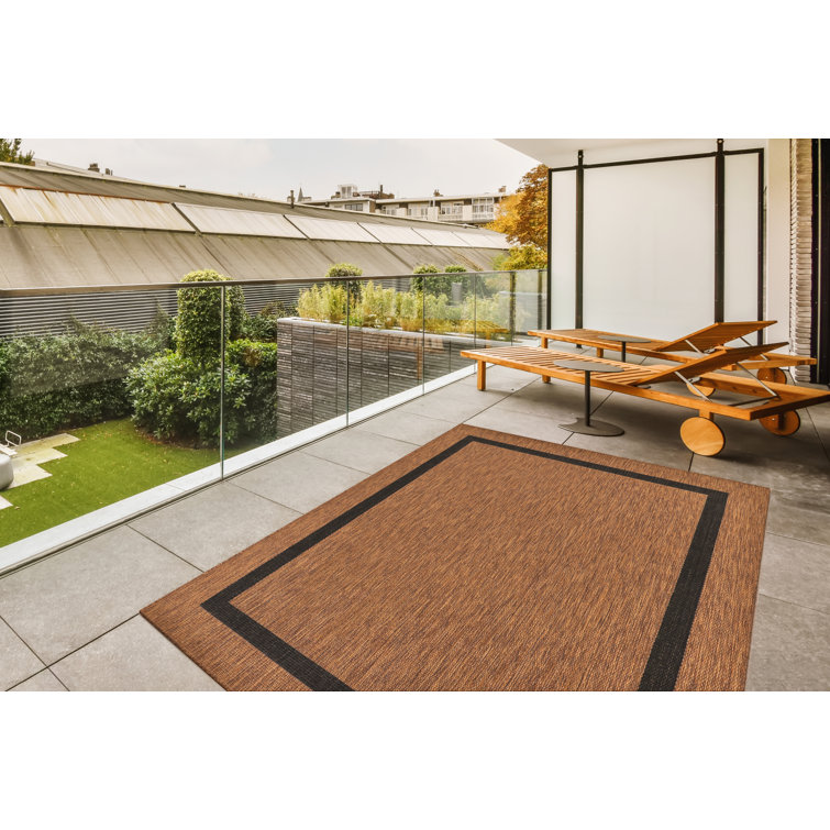 Mony Bordered Brown Indoor/Outdoor Area Rug Ebern Designs Rug Size: Rectangle 7'10 x 10