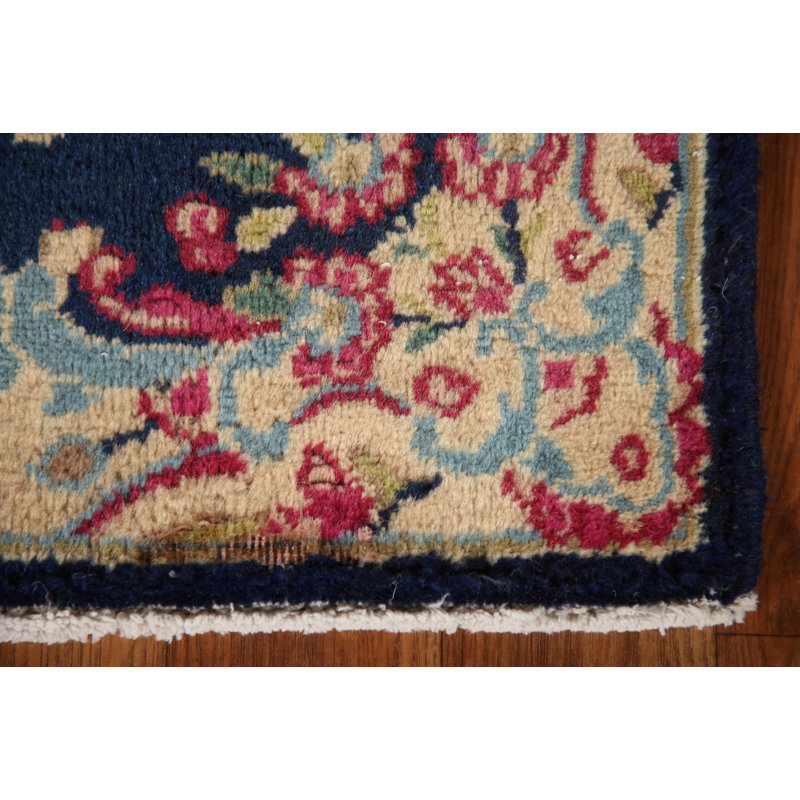 Tapis bleu carré à motif floral 2 x 2