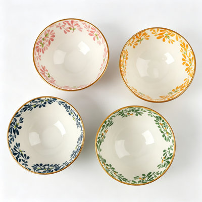 4.5 Inch Footed Ceramic Bowl with Underglaze Floral Pattern