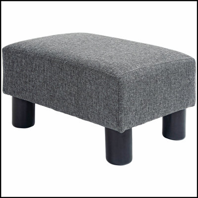 Repose-pieds compact gris anthracite avec repose-pieds en tissu de lin et pieds en plastique pour une utilisation polyvalente dans les petits espaces