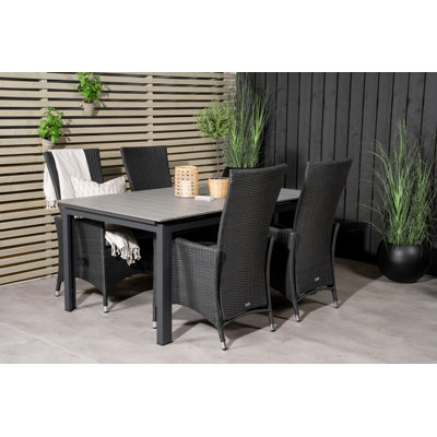 Albane 4 - Person Patio Dining Set with Extendable Rectangular Table , Cushions Included