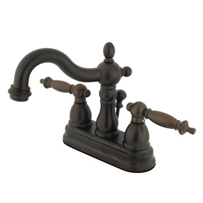 Kingston Brass Heritage Two-Handle 3-Hole Deck Mount 4" Centerset Bathroom Faucet with Brass Pop-Up