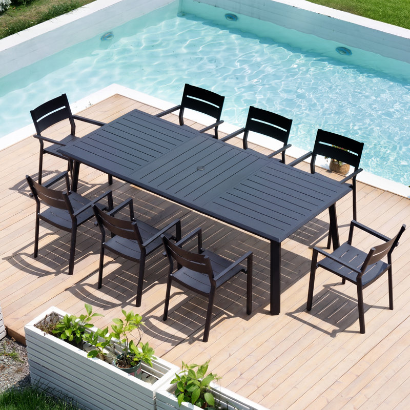Issei 8 - Person Patio Dining Set with Aluminum Rectangular Table and  Stacking Armchairs