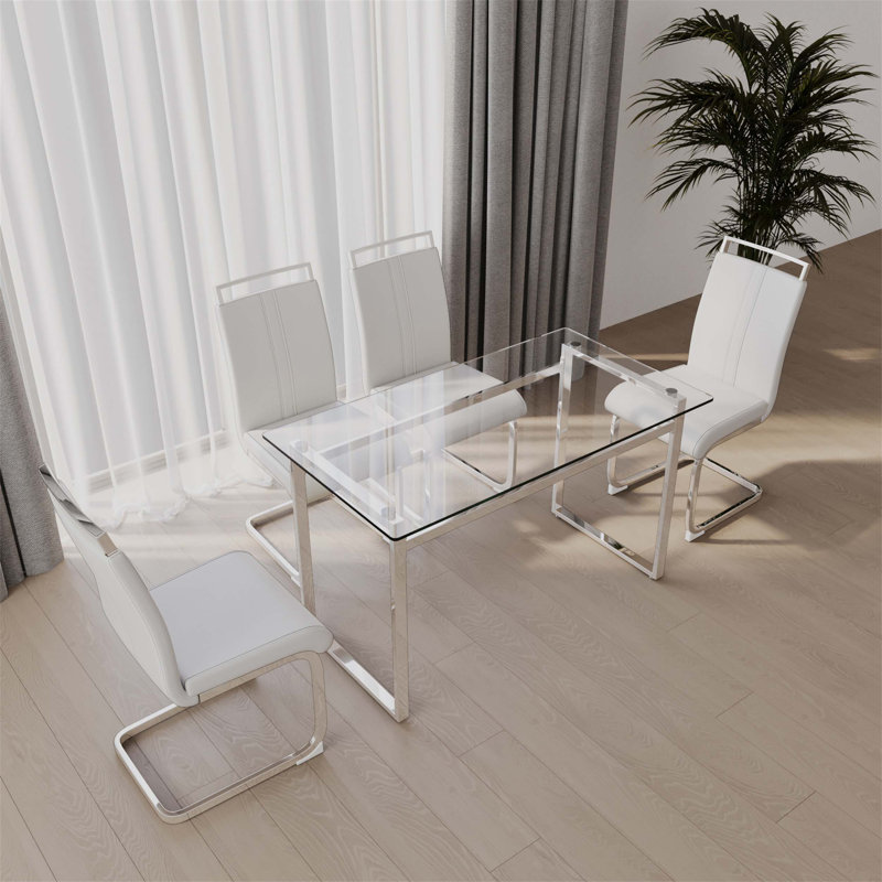 Ensemble de table de salle à manger élégant pour 4 personnes, avec des pieds plaqués argent et un plateau en verre trempé, idéal pour les espaces de salle à manger modernes.